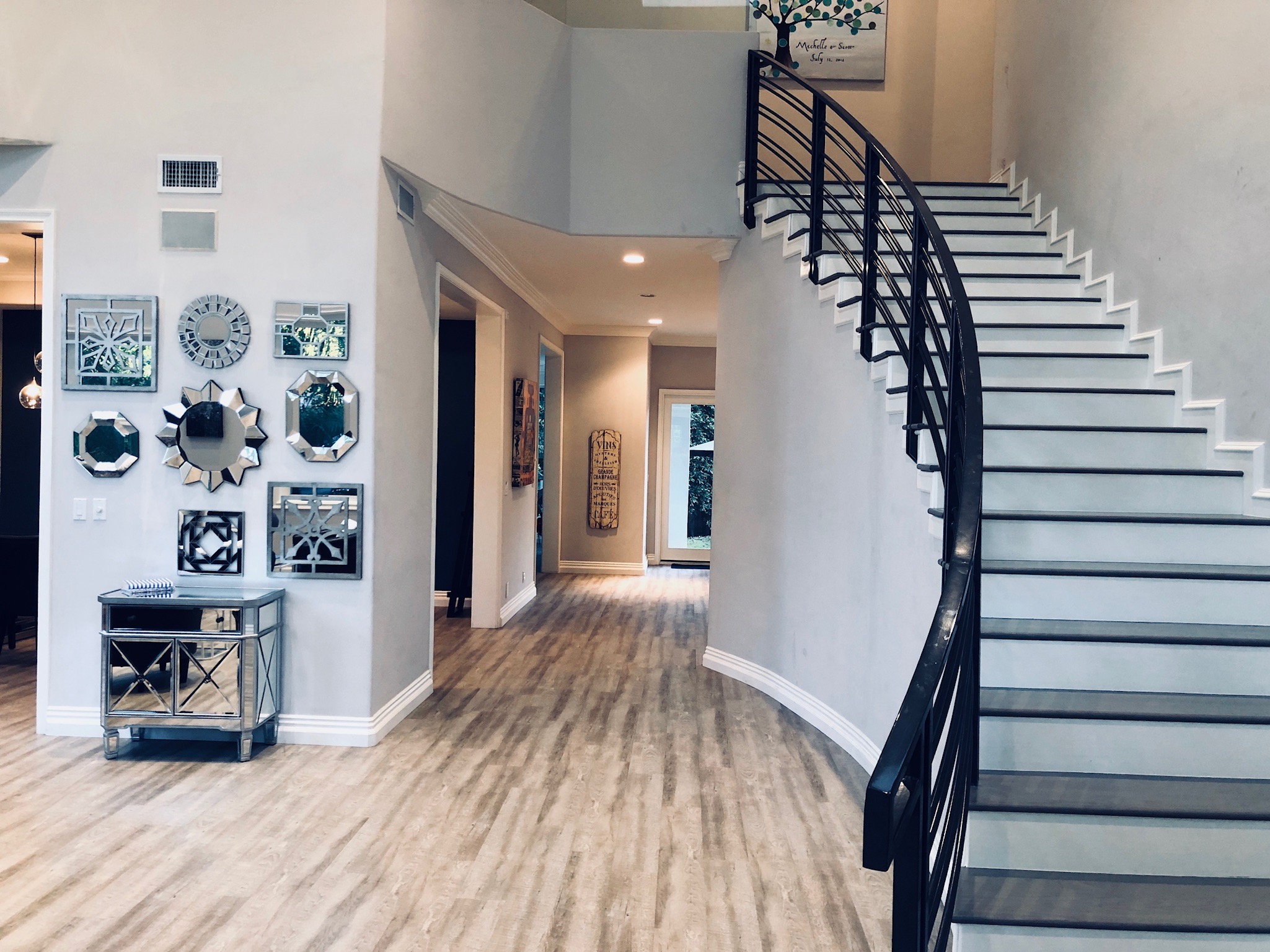Stairs-Living-Room-with-Hallway-to-Den-Kitchen
